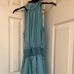 New in bag Took out for the pictures. Aqua dress by Venus